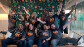 PagerDuty team members cheering with their arms in the air PagerDuty team members cheering with their arms in the air